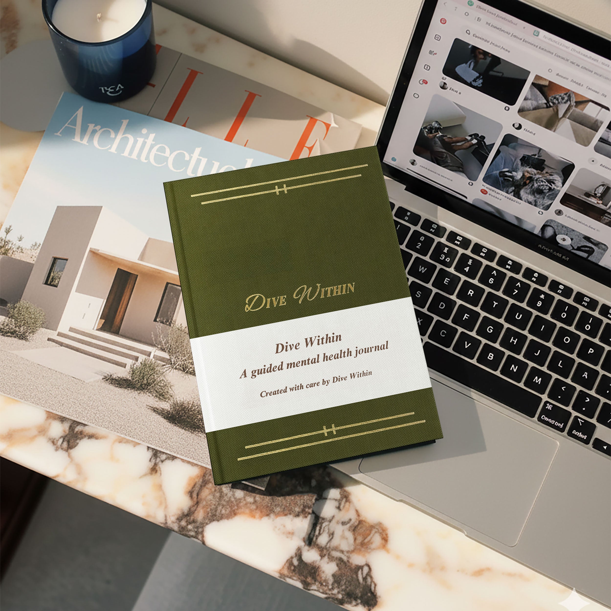 Dive Within journal on a marble desk